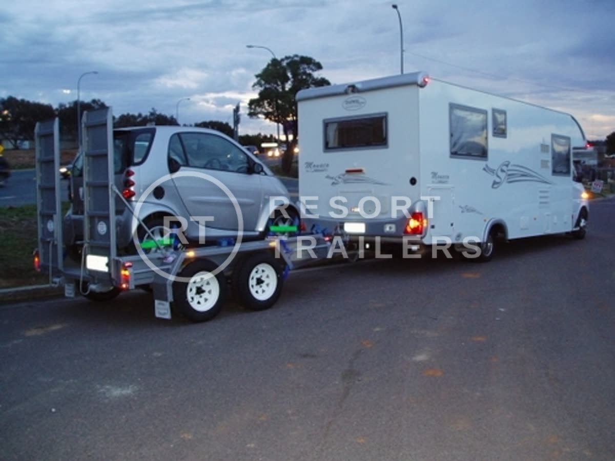 Small vehicle trailer loaded — built by Resort Trailers