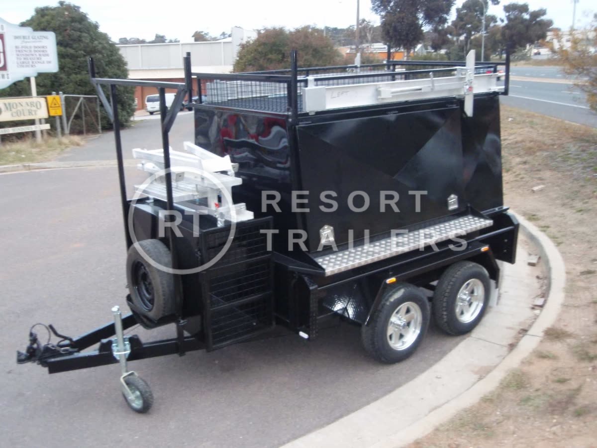 Dual axle tradesman trailer enclosed with site box and roof racks — built by Resort Trailers