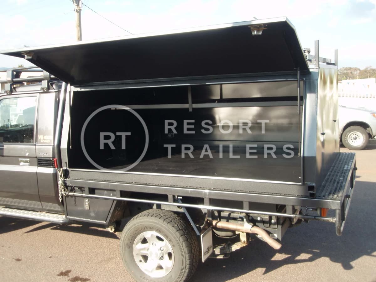 Enclosed tray modification for dark grey ute — built by Resort Trailers